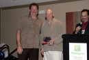Craig McMacken receives the Under 50 Cy Young Award from 1988 AL Cy Young winner, Frank Viola.