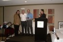 Paul Smith receives his Over 50 Cy Young Award from Ron Coomer and Dick Stigman.
